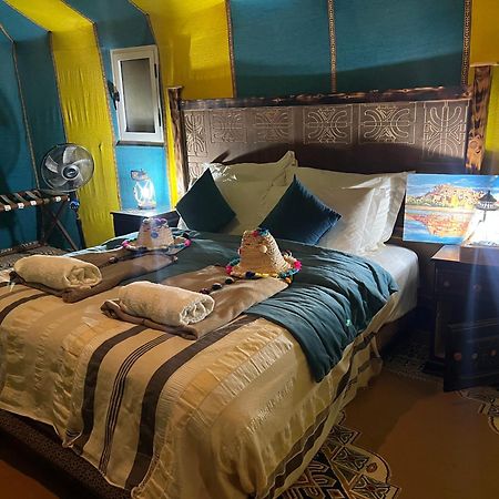 Sahara Majestic Luxury Camp Hotel Merzouga Exterior photo A bedroom in a luxury tent